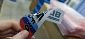 Custom-shape Stickers, PVC (Transparent) Removable Sticker Material, Reverse Print with White Overlay Printing, on glass door, seen from inside, peel off