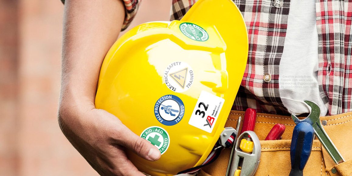 #YourLabelwithODP - Mockup Photo of PVC (White) Stickers for Labelling Safety Helmets used in Construction Sites, by onedayprint.com.sg, Assets from freepik were used.