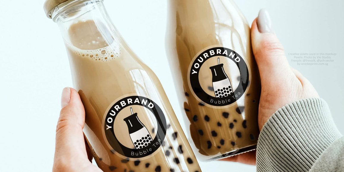 Mockup Photo of Transparent Stickers with White Ink Printing on bottles, by onedayprint.com.sg, Photo by Vie Studio from Pexels, Assets from freepik were used.